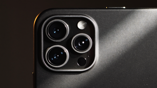 Extreme macro close-up of a precision-machined triple-lens camera cutout on a premium foldable phone case — the engineering tolerances that change between the Samsung Galaxy Z Fold 7 and Galaxy Z Fold 8