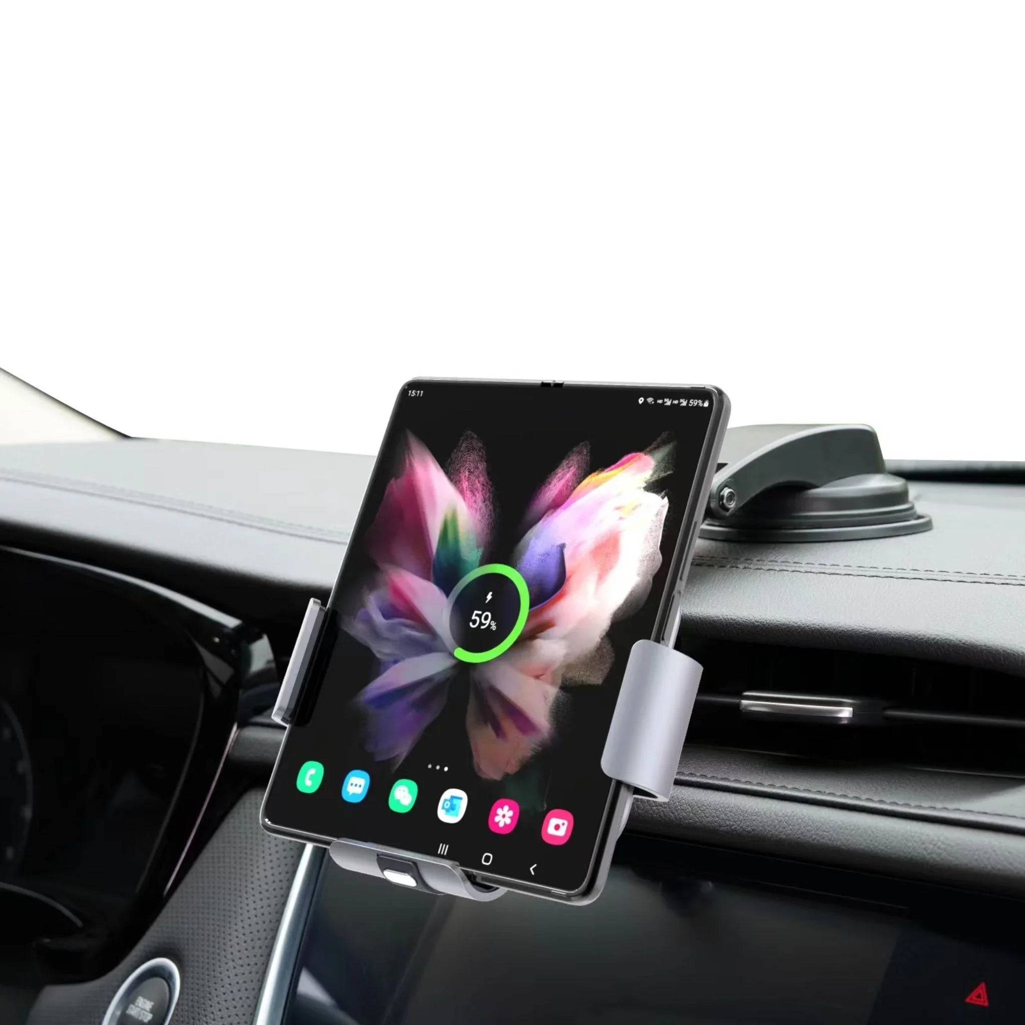 Foldable smartphone charging on car dashboard mount with colorful butterfly screen