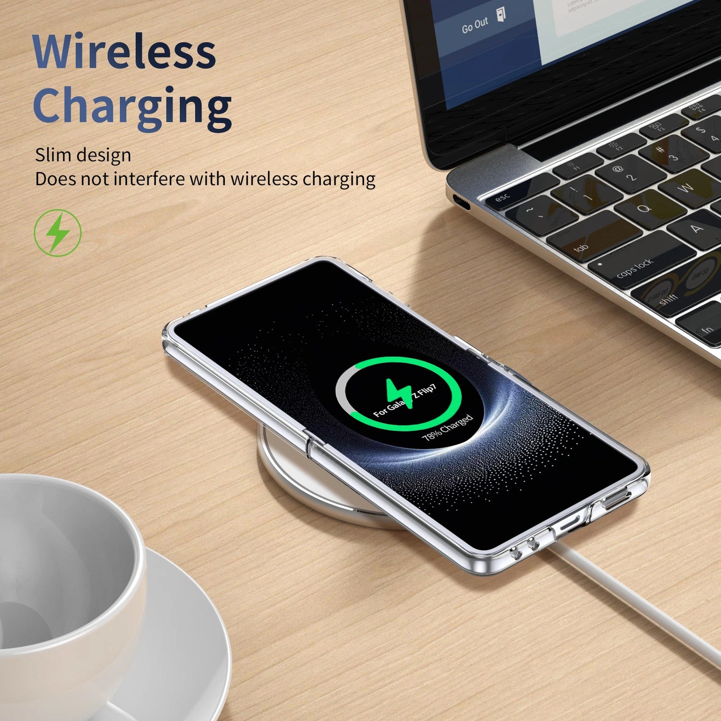 Wireless charging pad with smartphone on a desk next to a laptop