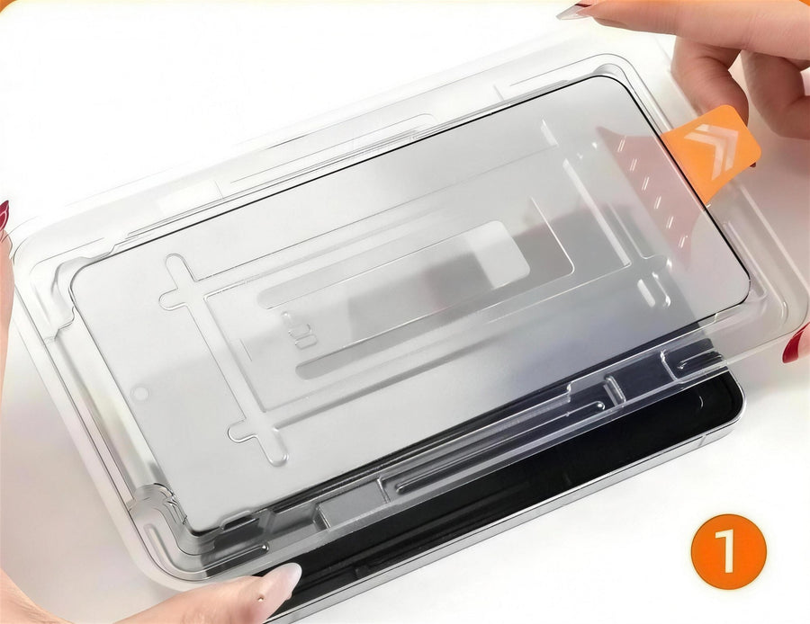 Lowering the Ion Glass auto-alignment tray over a closed Galaxy Z Fold, orange tab at the bottom edge